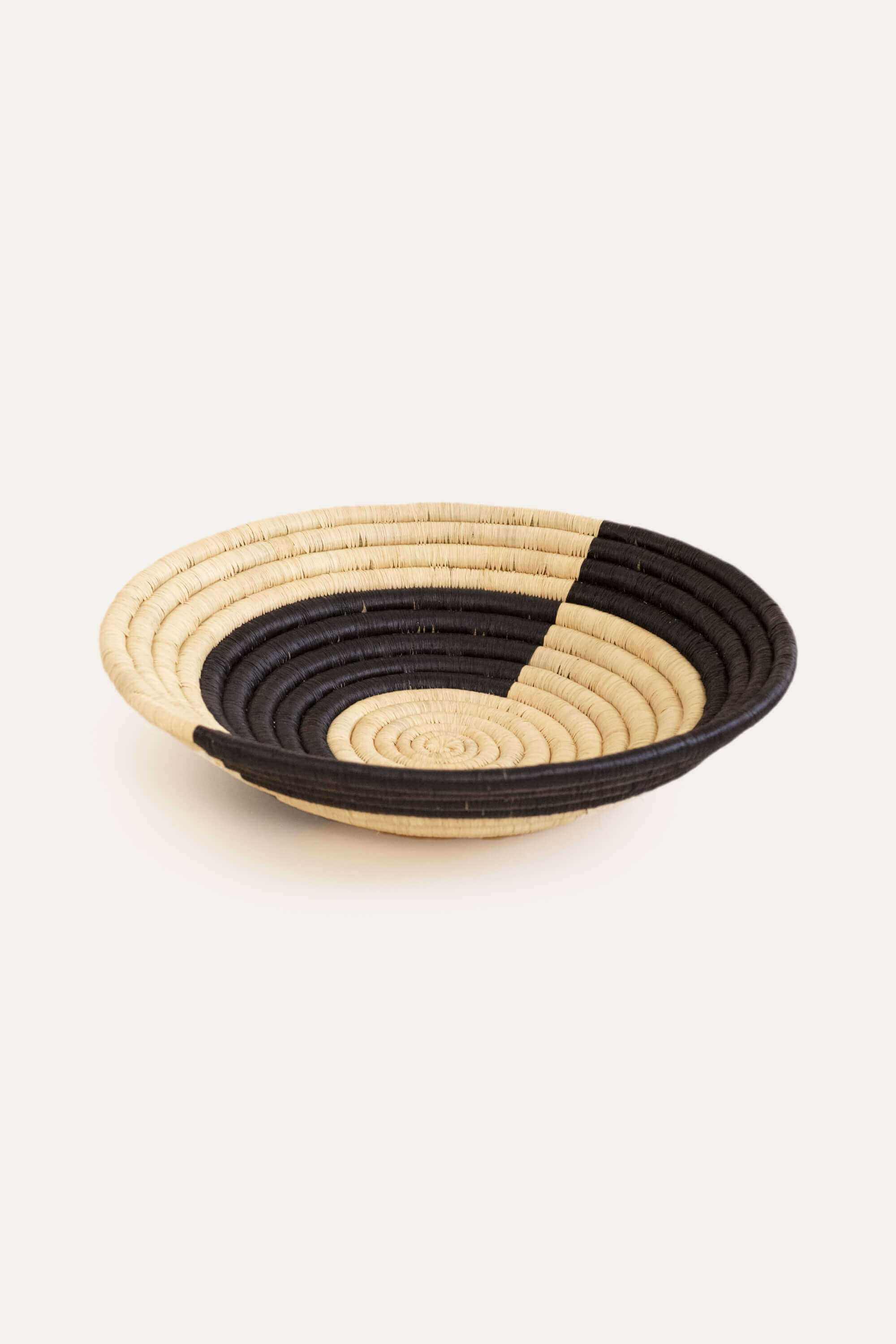 Black and beige decorative basket for storing fruits, trinkets and more