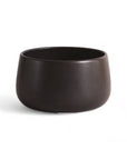 A black handmade ceramic serving bowl