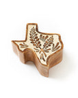 Wooden Texas-shaped decorative keepsake box with floral bluebonnet design on a white background