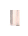 A striped tea towel with beige and navy colors, folded and presented against a white background