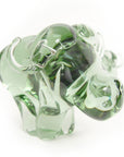 A handblown green recycled glass buffalo figurine