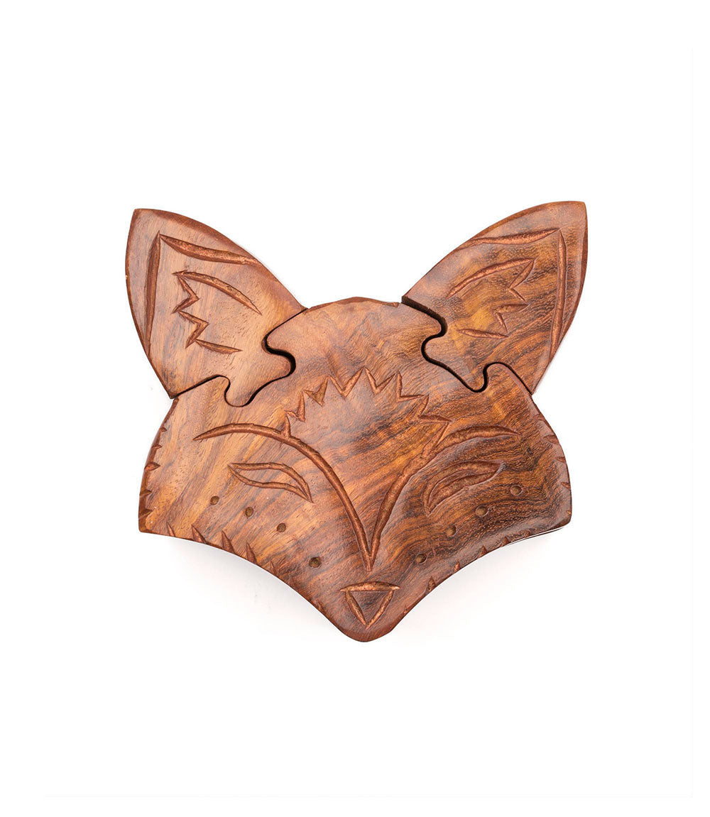 Hand-carved wooden fox face puzzle box with multiple pull-apart pieces.