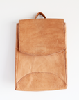 Brown leather backpack on a white background