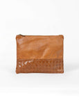 Brown leather pouch on a white background