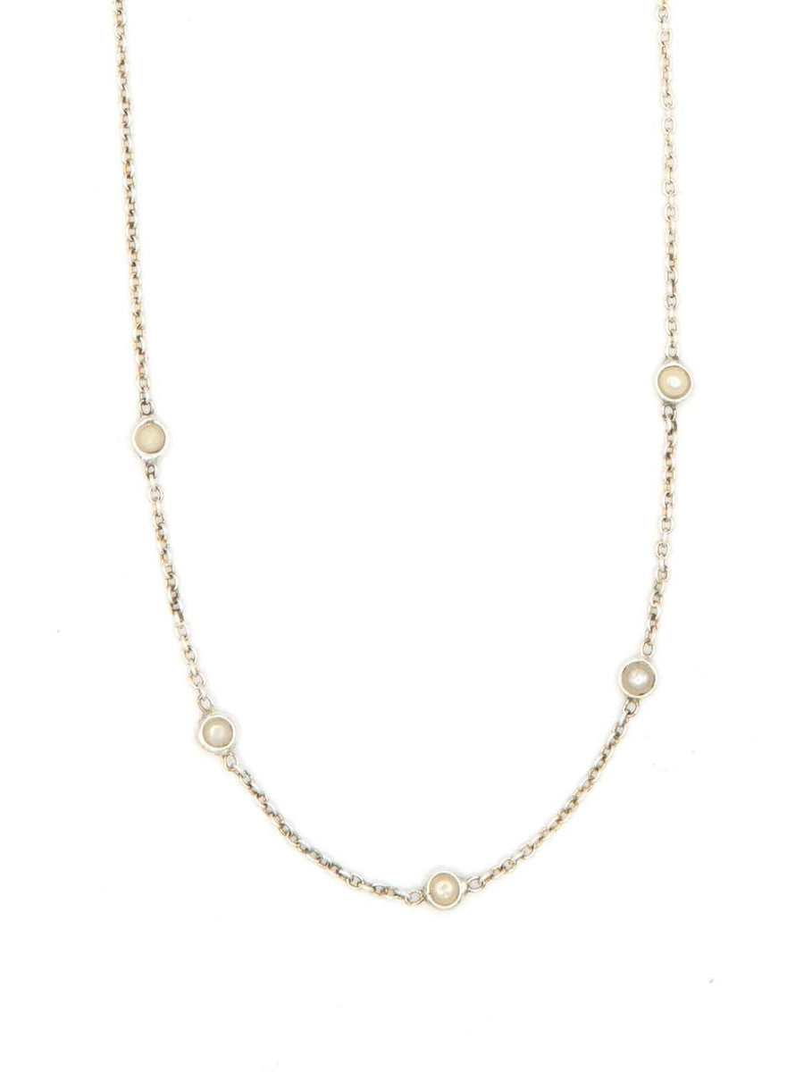 A sterling silver choker necklace with freshwater pearls layered throughout, measuring 16 inches in length.