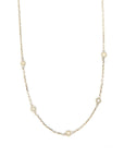 A sterling silver choker necklace with freshwater pearls layered throughout, measuring 16 inches in length.