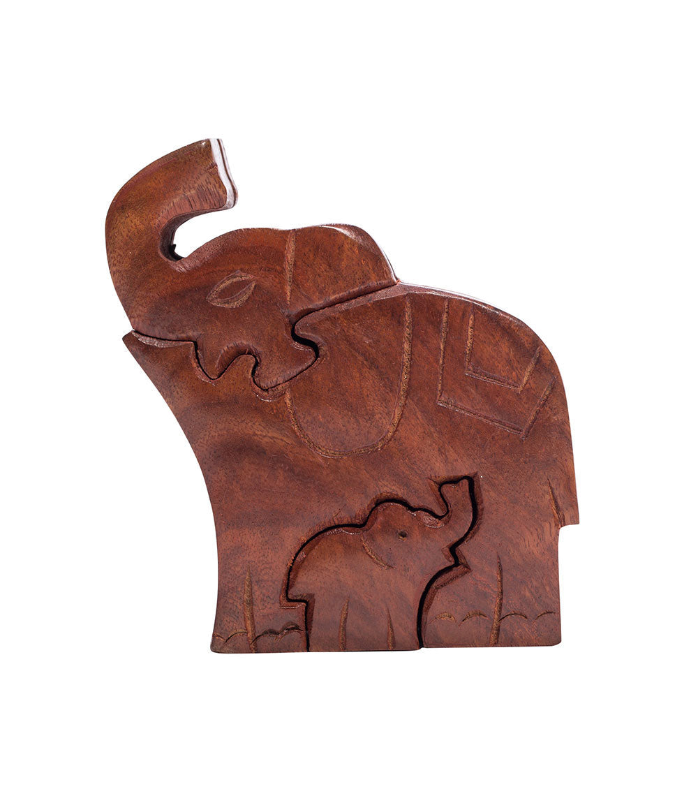 A hand-carved wooden puzzle box in the shape of an elephant with a baby elephant inside.