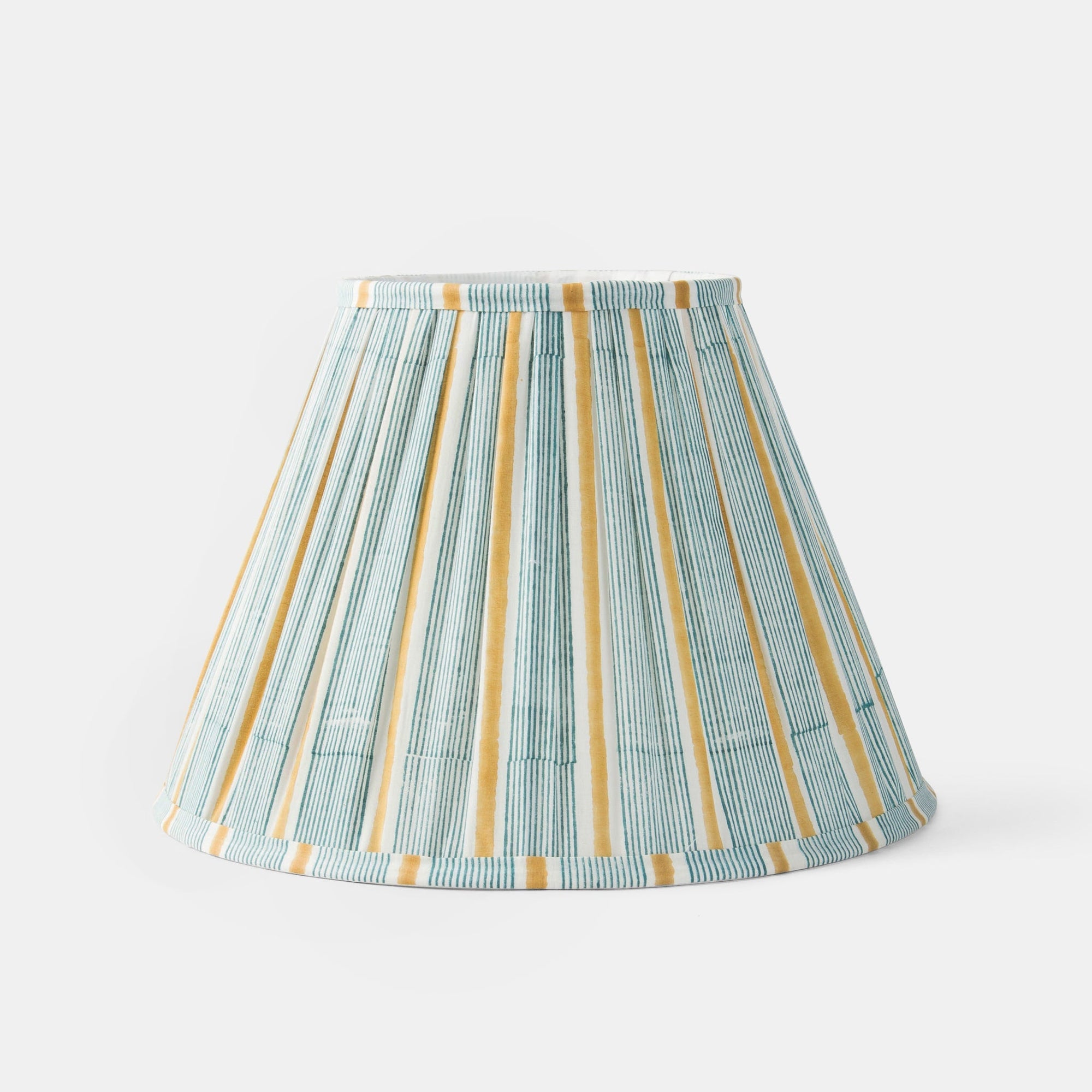 Striped lampshade with green and gold pattern on a white background.