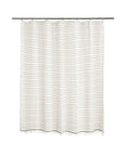 Striped shower curtain with wavy pattern on a white background
