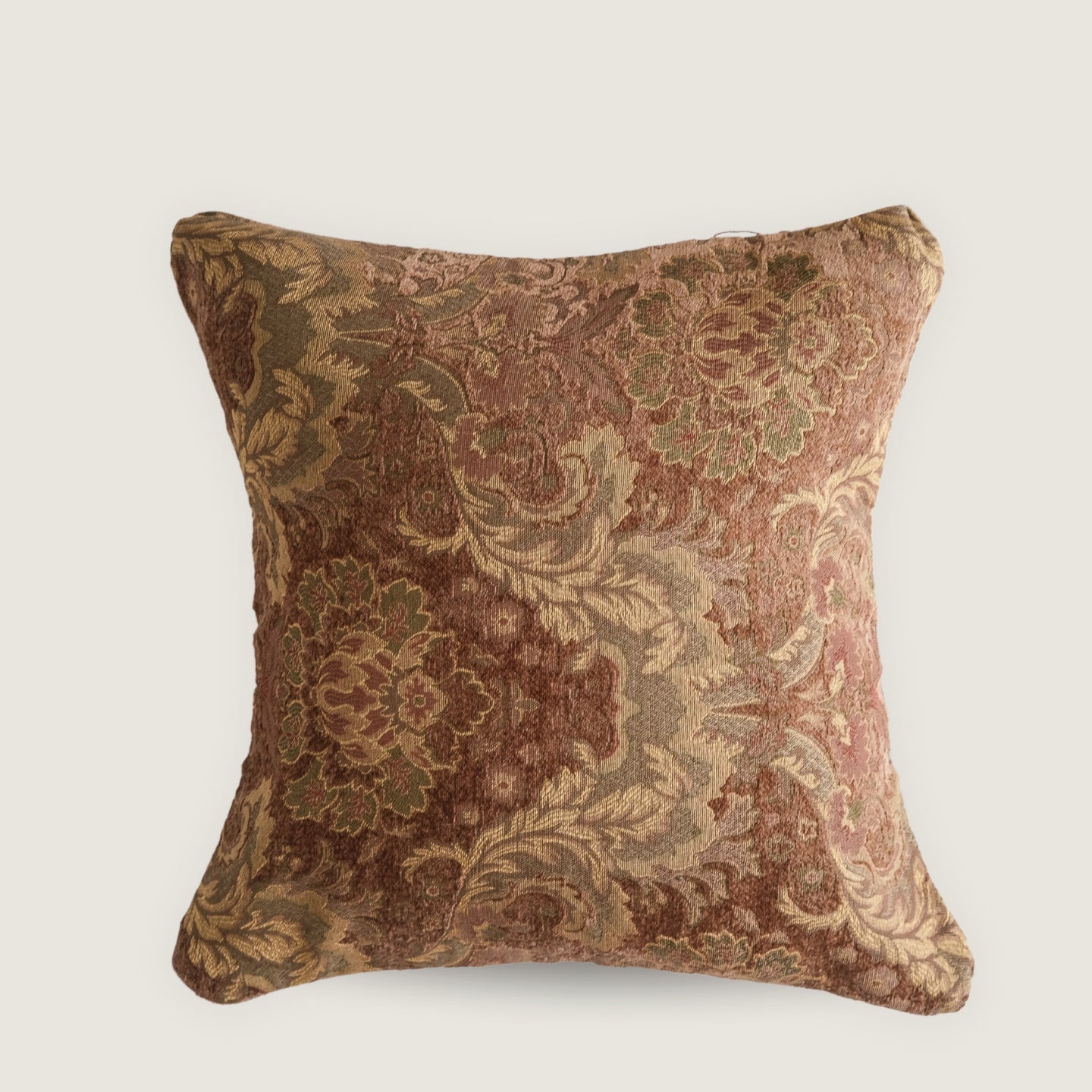 Decorative pillow with floral pattern on a light background