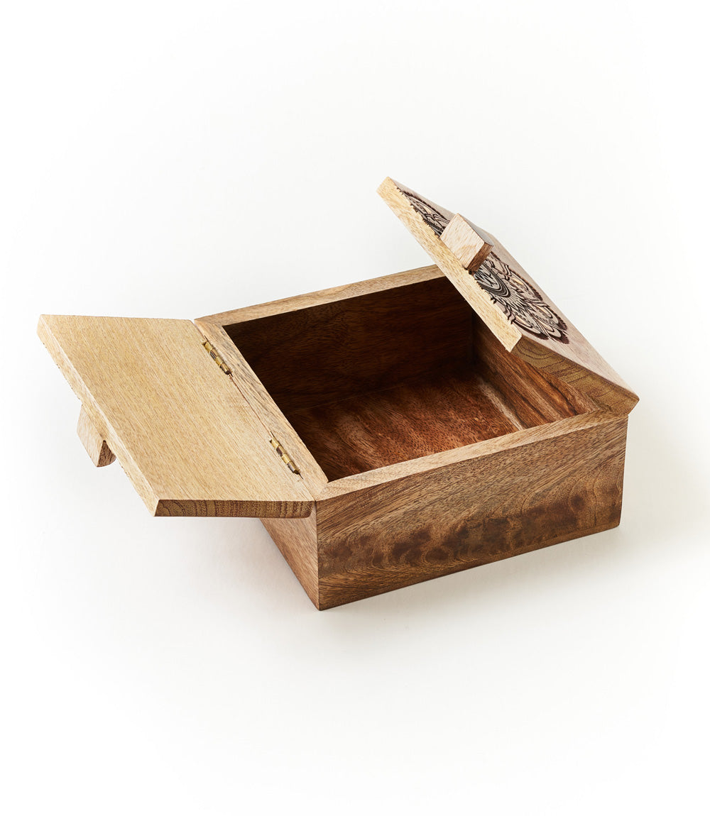 A square mango wood keepsake box with a mandala design and gold finish brass accents, opened up.