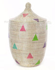 Woven basket with colorful geometric patterns on a white background