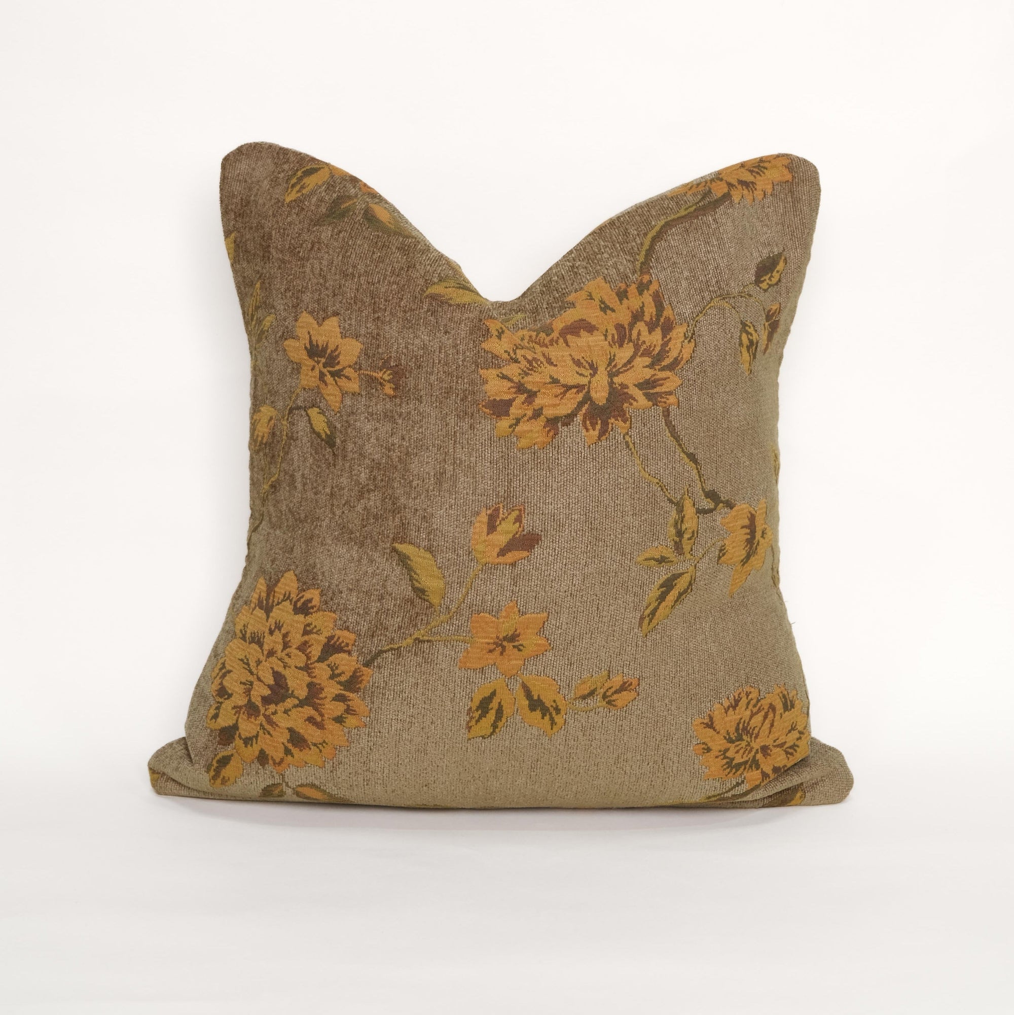 Floral-patterned pillow on a white background