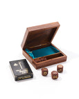A wooden game night box with brass inlay, opened and showing dice and pack of cards.