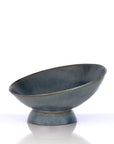 Blue ceramic bowl on a white background