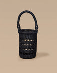 A black wine tote made from elephant grass, featuring an open weave design and a handle for carrying.