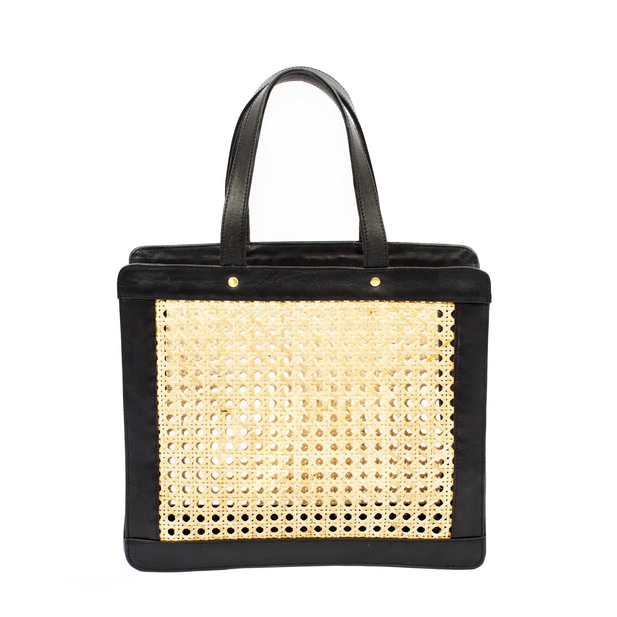 A black leather shoulder tote with rattan cane webbing and gold hardware.