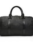 A black leather weekender bag with a leather handle and visible stitching details.