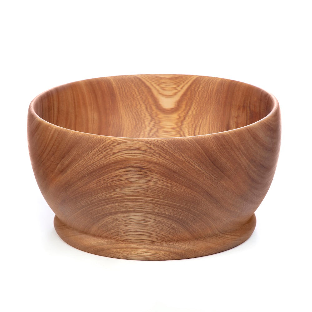 A large wooden bowl with a visible grain pattern, displayed against a plain background.