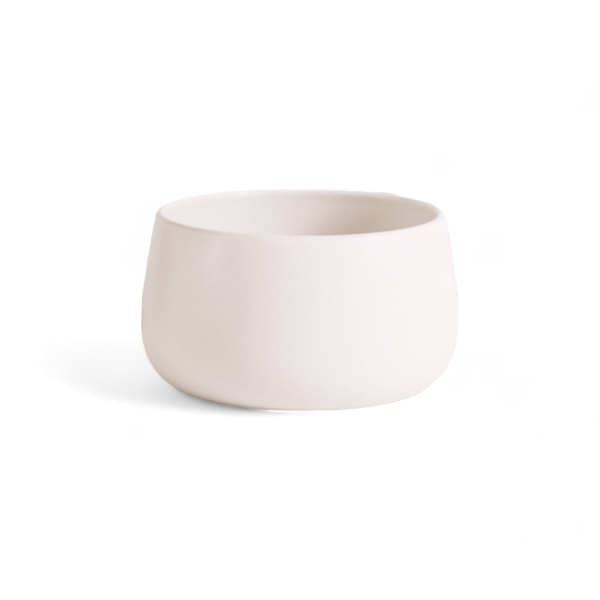 A hand-carved stoneware serving bowl with a white color and a capacity of 68 oz