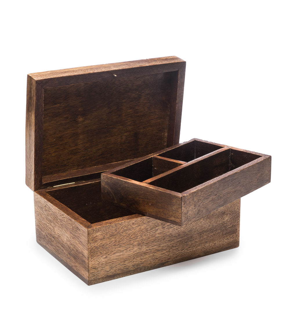 Wooden jewelry box with compartments on a white background