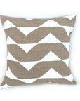 Decorative pillow with beige and white chevron pattern on a white background