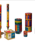 Colorful Hanukkah candles on a white background