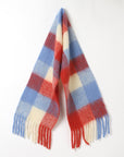Plaid scarf with red, blue, and beige colors on a white background