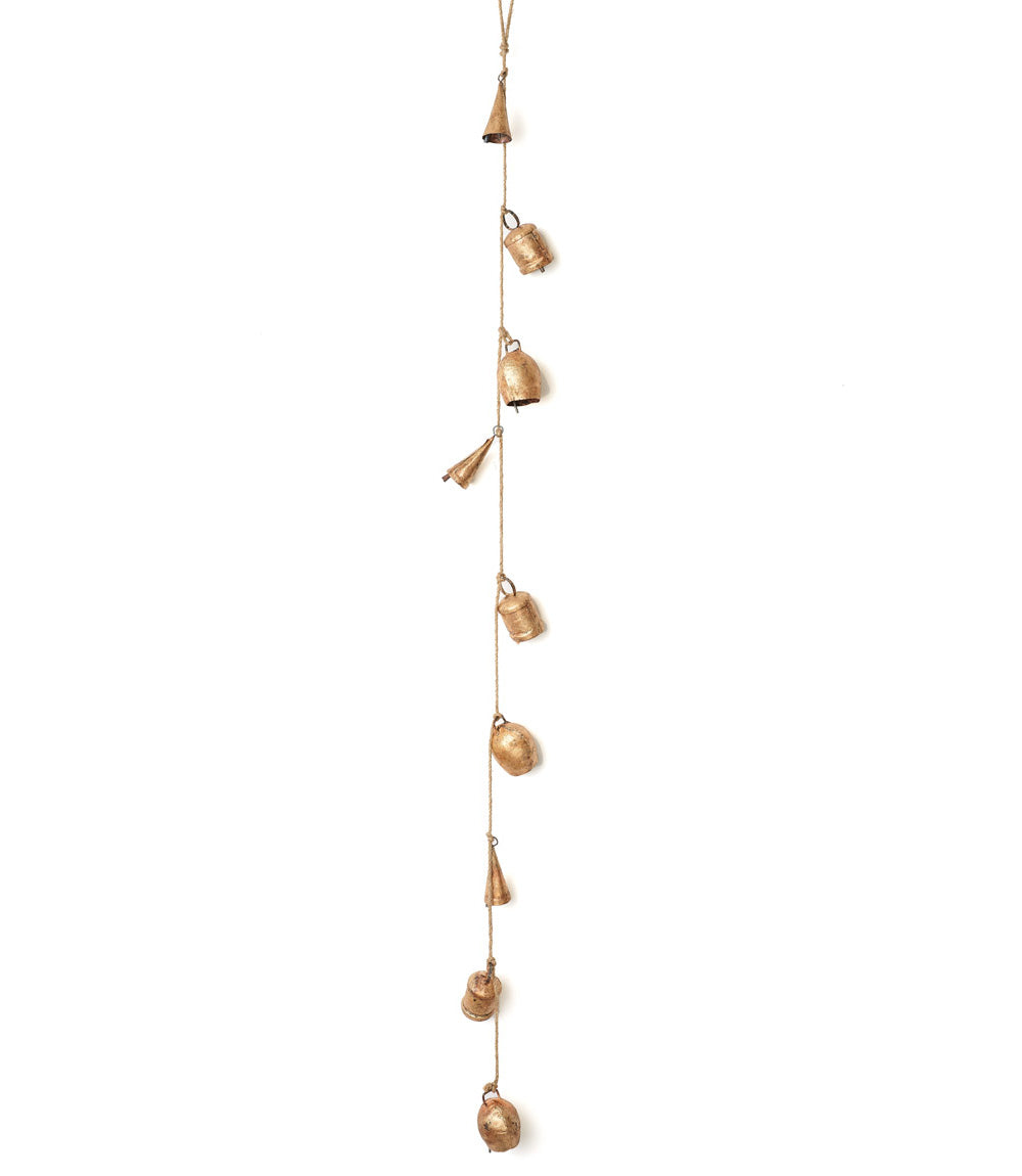 A gold-colored rustic bell hanging garland