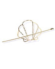 Gold shell design hairpin on a white background