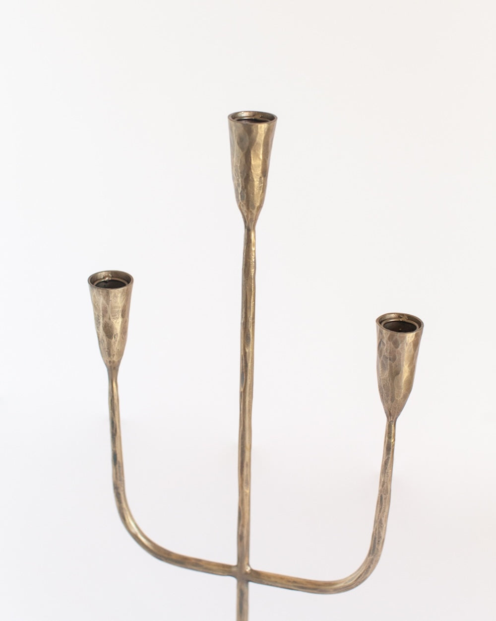 Brass candelabra on a white background