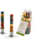 Set of colorful candles with a Star of David design on a white background