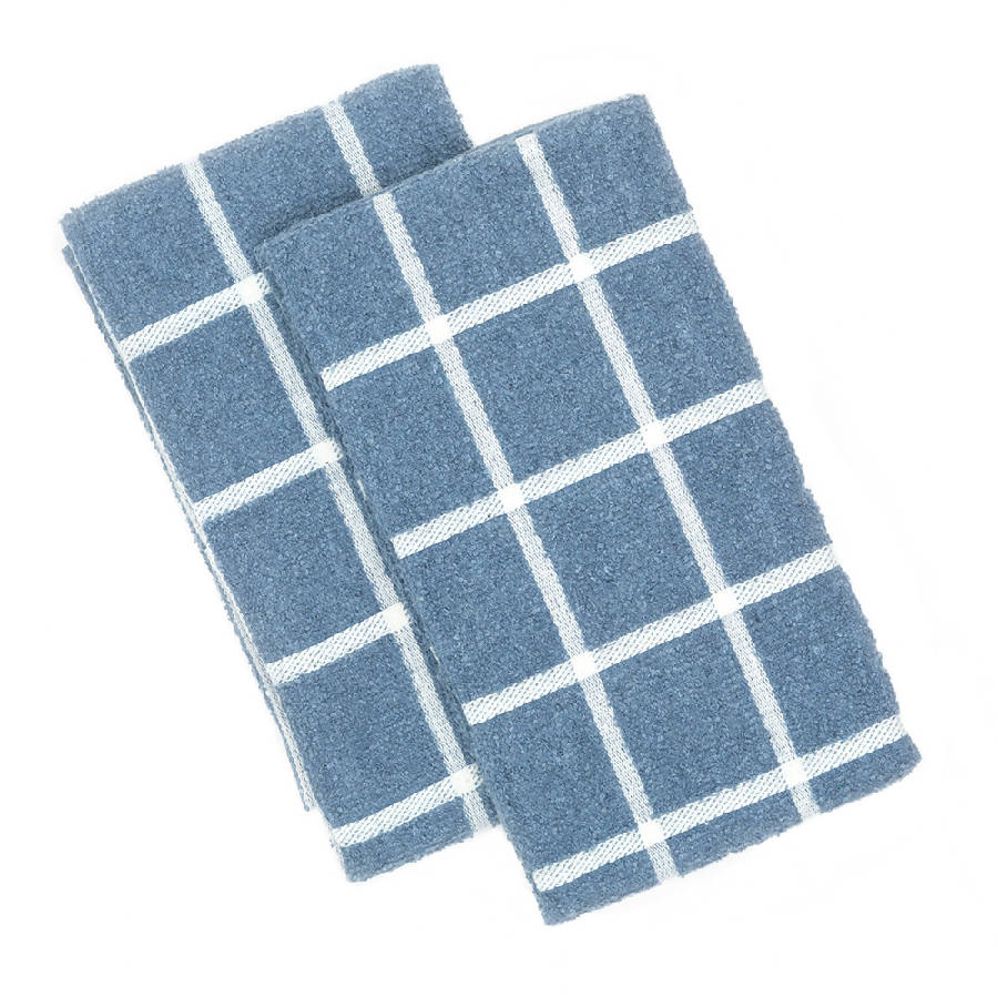 Two terry kitchen towels in blue and ecru colors with a grid pattern
