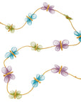 A colorful garland made from sustainable abaca, featuring various sized butterflies woven for a three-dimensional form, displayed against a white background.