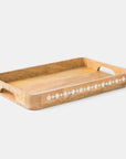 Wooden tray with diamond pattern on a white background