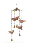 A decorative bird carousel wind chime with multicolored glass beads and iron birds with a hand-painted finish