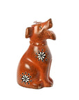 Hand-carved soapstone sculpture of a dog with a brown hand-dyed finish, standing with a white background