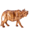 Wooden water buffalo figurine on a white background