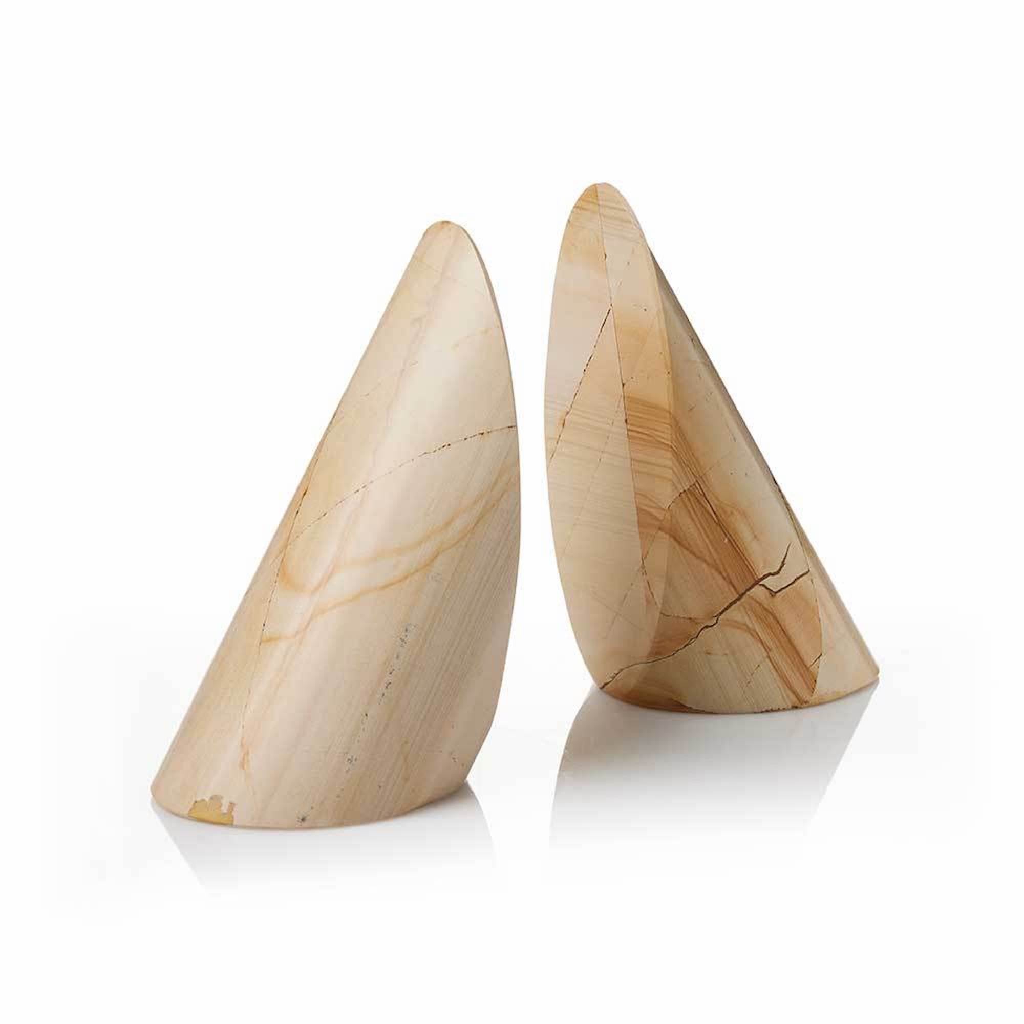 A pair of Burma teak stone bookends with a natural stone-like pattern