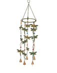 Hanging circular wind chime with dragonflies and golden bells at the bottom