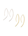 Pairs of brass and silver-plated recycled metal earrings.