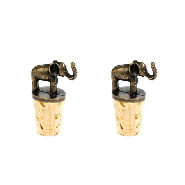 A set of two brass elephant wine bottle stoppers sitting atop corks.
