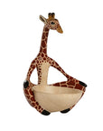 Giraffe figurine holding a trinket bowl