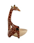 Giraffe-shaped decorative trinket dish on a white background