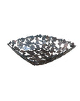 A handcrafted decorative bowl and trinket dish made of assorted recycled iron keys with a copper-colored finish.