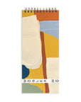 Notebook with abstract design and 'Moglea' branding on a white background