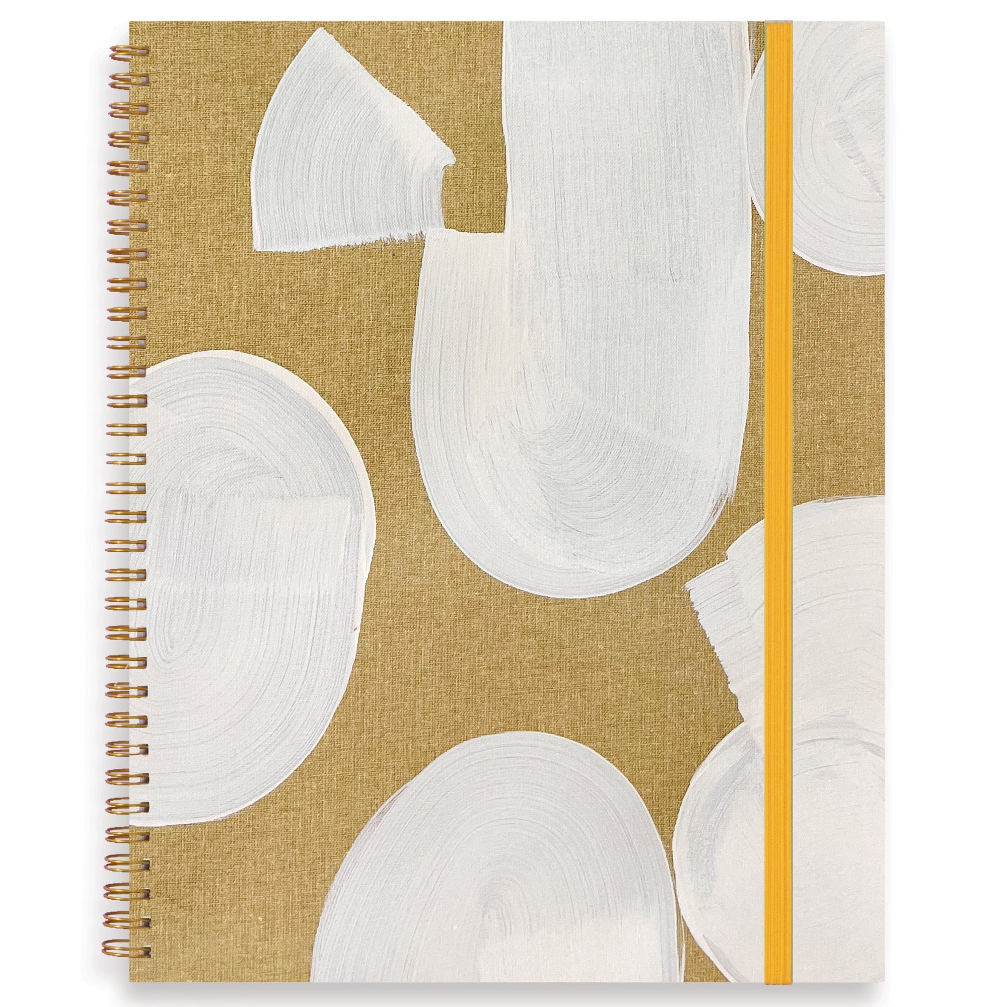 Notebook with white abstract shapes on a gold background