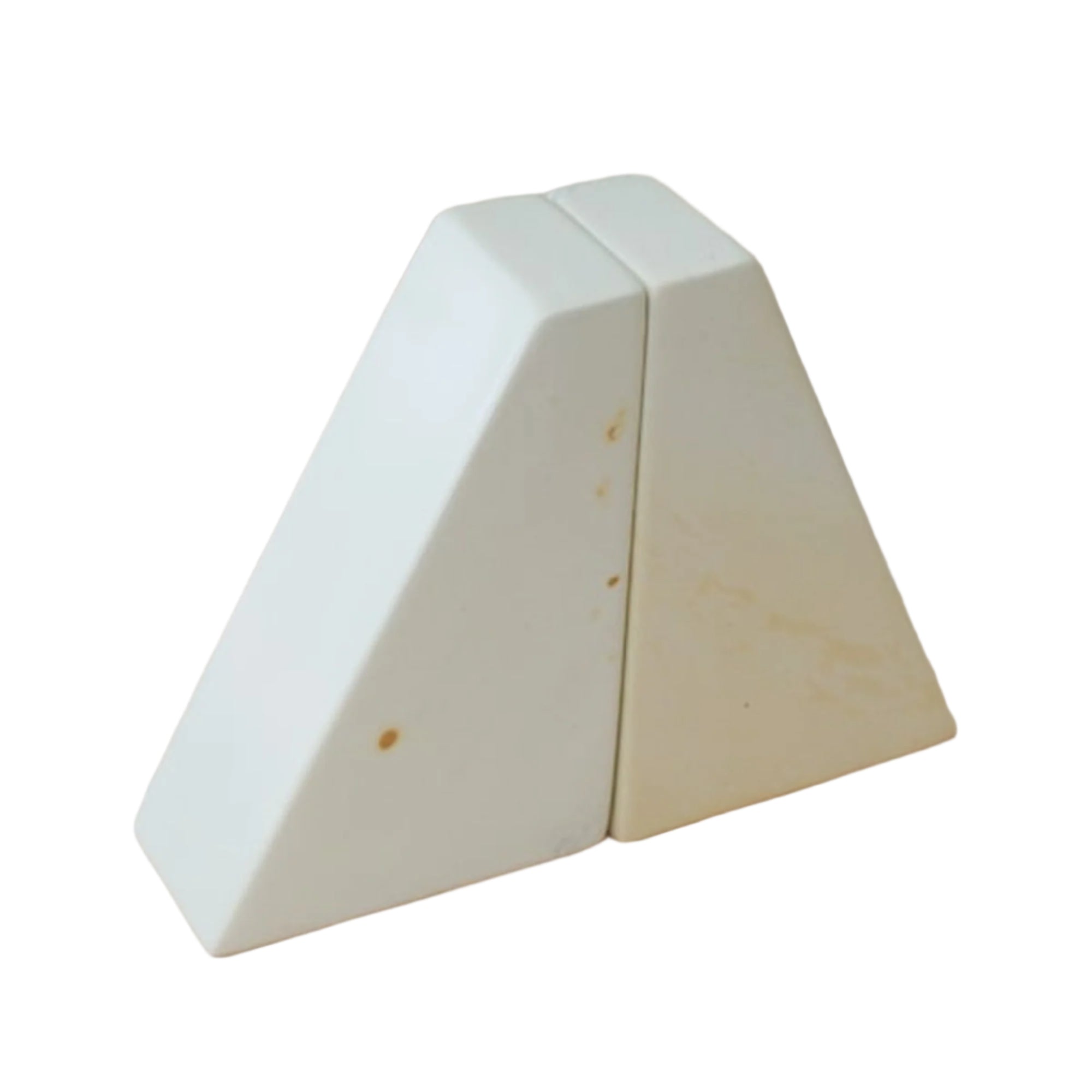 A pair of natural stone bookends, hand-carved and displayed against a white background