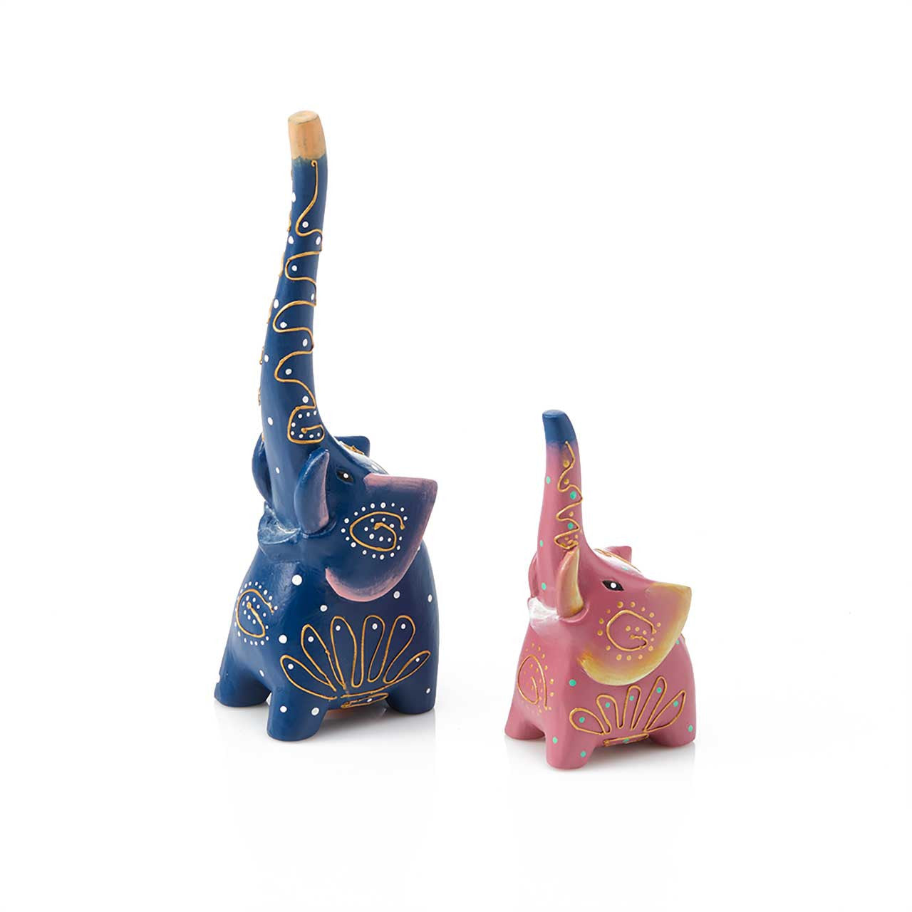 Decorative elephant figurines, one blue and one pink, on a white background
