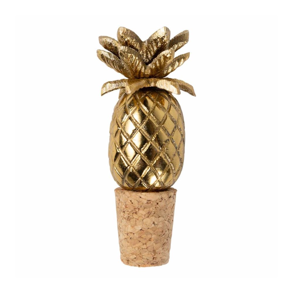 Gold pineapple-shaped bottle opener with cork base on a white background